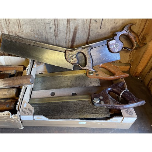 20 - Two boxes of carpenters tools to include, large chisels, gouges, spirit levels and saws. (2)