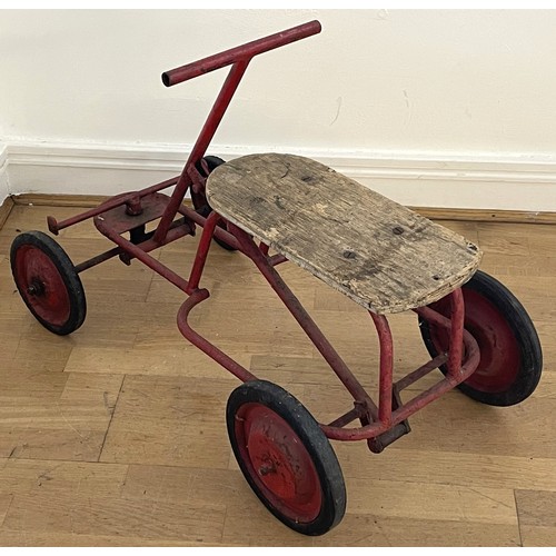 30 - A mid twentieth century child's hand powered rolling cart utilising a push-pull mechanism featuring ... 