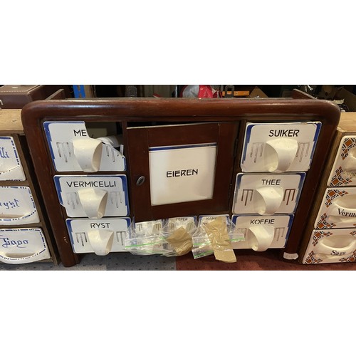 36 - Three vintage wall-mounted wooden spice racks, with assorted ceramic drawers. Some damage and missin... 