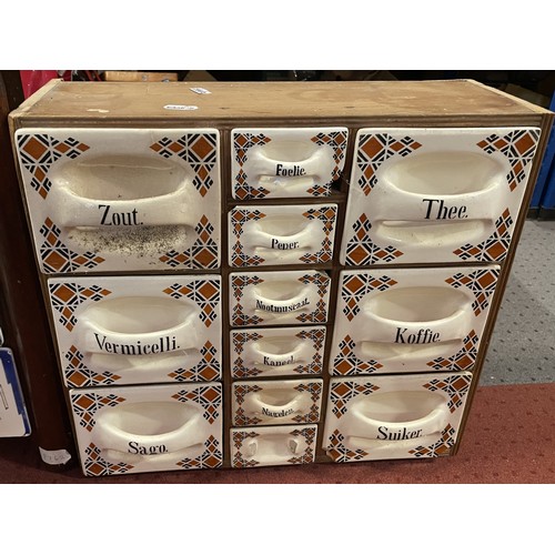 36 - Three vintage wall-mounted wooden spice racks, with assorted ceramic drawers. Some damage and missin... 