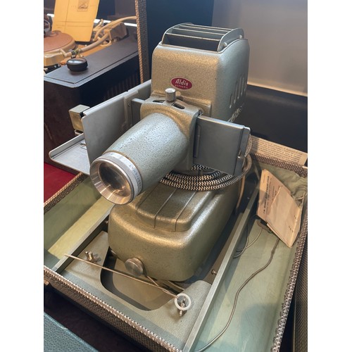 49 - A collection of Hi-Fi and vintage tech to include a Celfix projector screen, an Aldis projector, a G... 