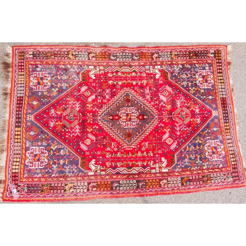 599 - RED GROUND MIDDLE EASTERN RUG 240CM X 160CM