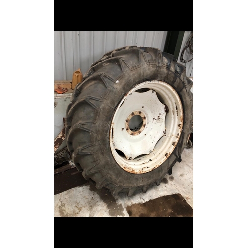 99 - PAIR OF NEW HOLLAND 8 STUD REAR WHEELS AND TYRES