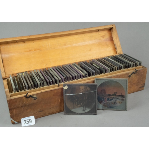 259 - WOODEN CASED MAGIC LANTERN + WOODEN BOX OF LANTERN SLIDES VARIOUS TOPICS