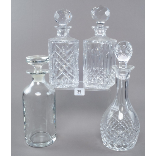 35 - FOUR CRYSTAL DECANTERS