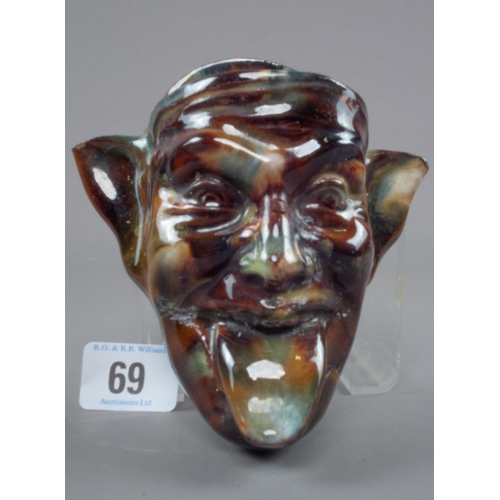 69 - TREACLE GLAZE GROTESQUE FACE WALL POCKET A/F