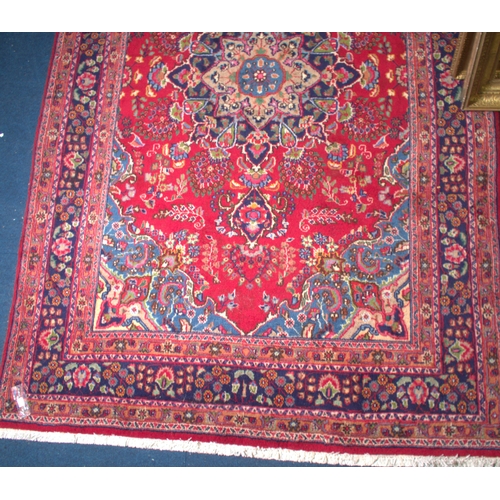 692 - RED GROUND IRANIAN RUG 290CM X 190CM