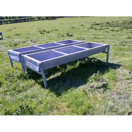 124 - PAIR OF CATTLE TROUGHS