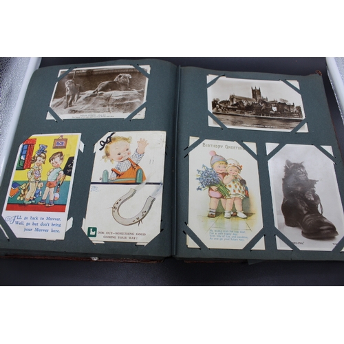 516 - Album containing Vintage Postcards Including Mabel Lucie Atwell