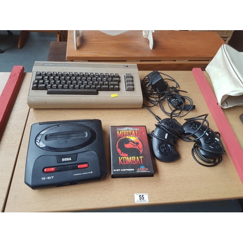 55 - Sega Saturn console, controllers, Mortal Combat game and a Commodore 64