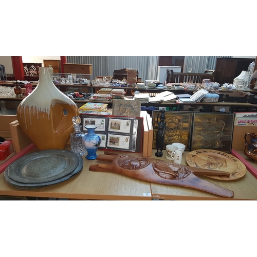 98 - Miscellaneous items to include early Pewter plates, first day covers, African carving , large pot et... 