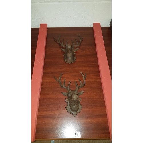 48 - 2 cast iron deer heads