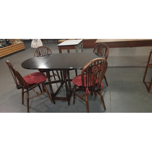 214 - Oak table with 4 chairs