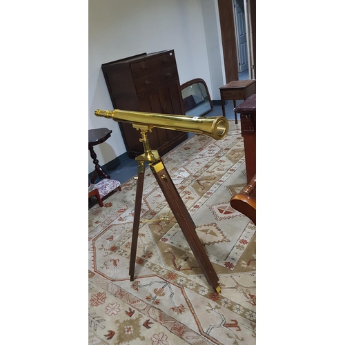 235 - Brass telescope on tripod stand