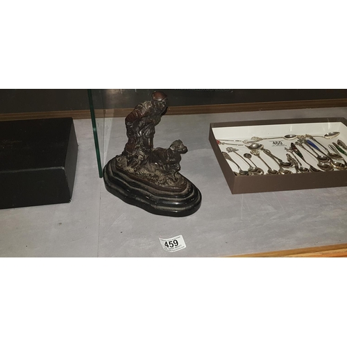 459 - Bronze figure of a hunter and his dog on a black marble base marked Mene