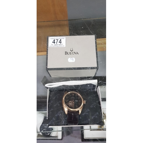 474 - Bulova open faced , 21 jewels automatic watch with gold numerals and papers