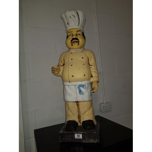 59 - Large plaster baker figure