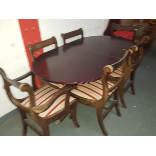 512 - Wooden dining table with 6 chairs including 2 carvers