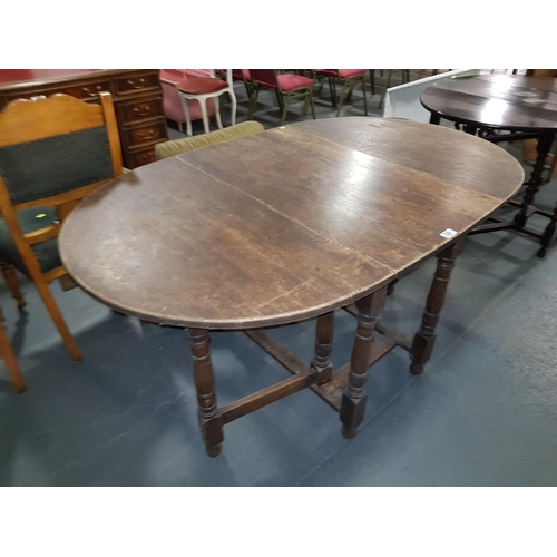 226 - Oak gateleg dining table