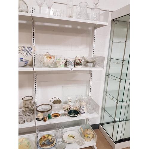 62 - Four shelves of mixed glass and china