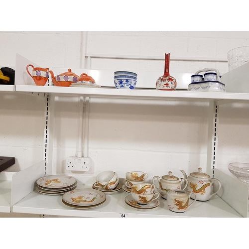 64 - Two shelves of oriental ware