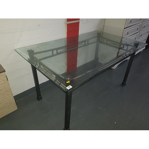 708 - Glass topped dining table