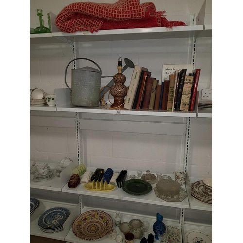 60 - 4 shelves of mixed items including waffle blanket, glass and china