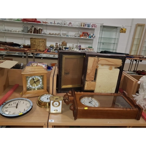 38 - Quantity of vintage clocks, display boxes etc.