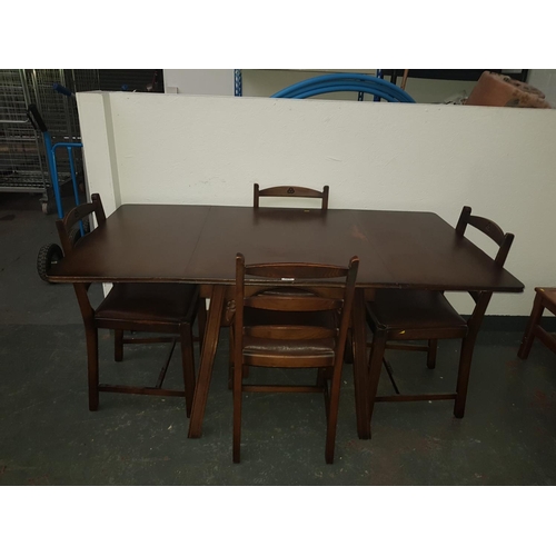 650 - Wooden dining table with 4 chairs