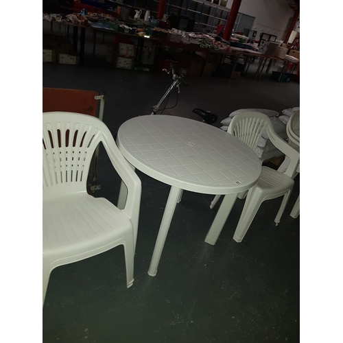 676 - Garden table and 4 chairs