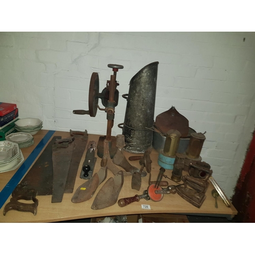 720 - Quantity of vintage tools including large scuttle pot, hand saws etc.