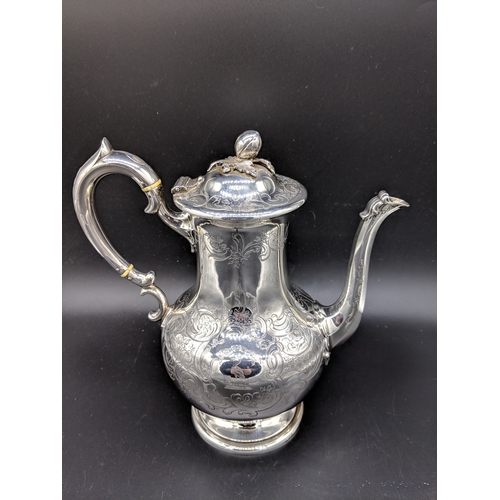 497 - A hallmarked silver coffee pot - London hallmarks- Lambert and Rawlings - 1855 - total weight in exc... 