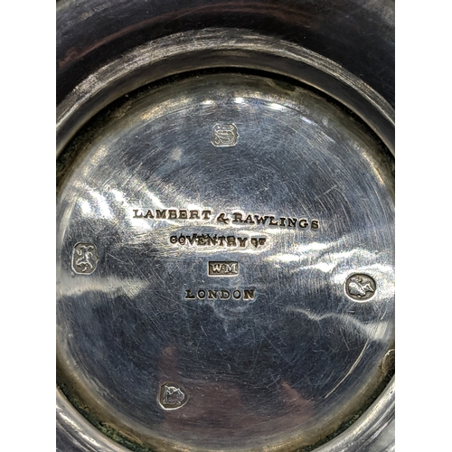 497 - A hallmarked silver coffee pot - London hallmarks- Lambert and Rawlings - 1855 - total weight in exc... 