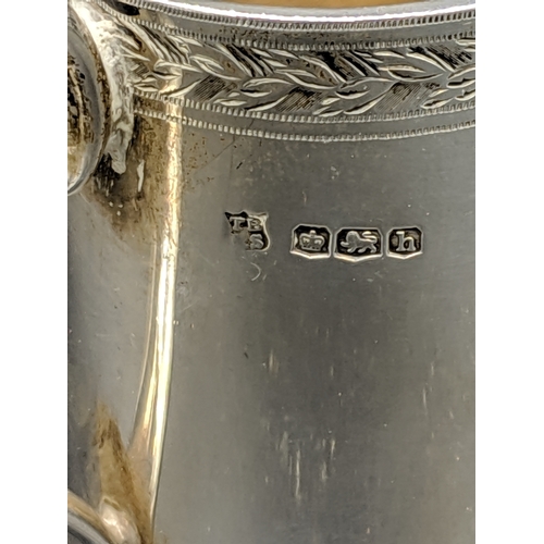 500 - A hallmarked silver tea set consisting of a sugar bowl, teapot and milk jug - Sheffield hallmarks - ... 