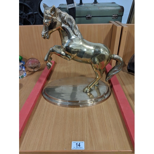 14 - A brass horse on a brass base