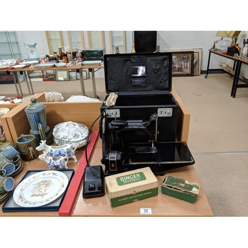 38 - Boxed Singer sewing machine 222K with accessories