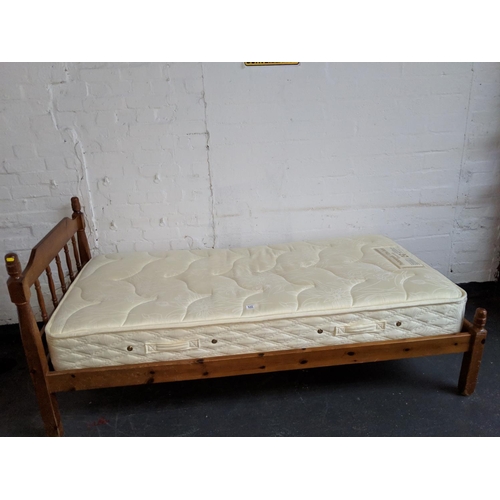 522 - Pine framed single bed with mattress