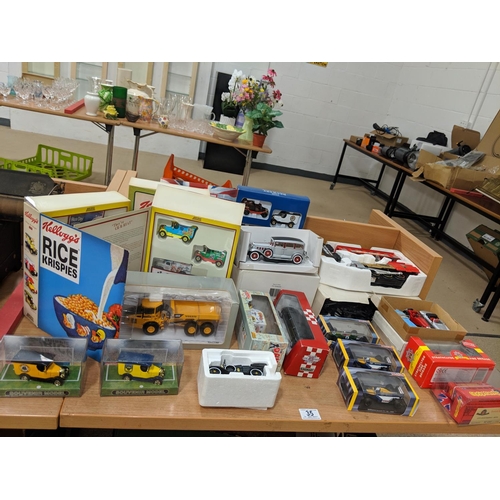 35 - A selection of boxed collectors cars ; Lledo, Atlas etc.