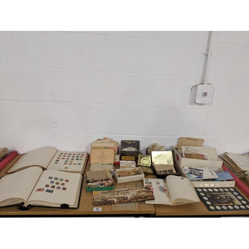 62 - A quantity of mixed stamps, some mounted,some loose etc.