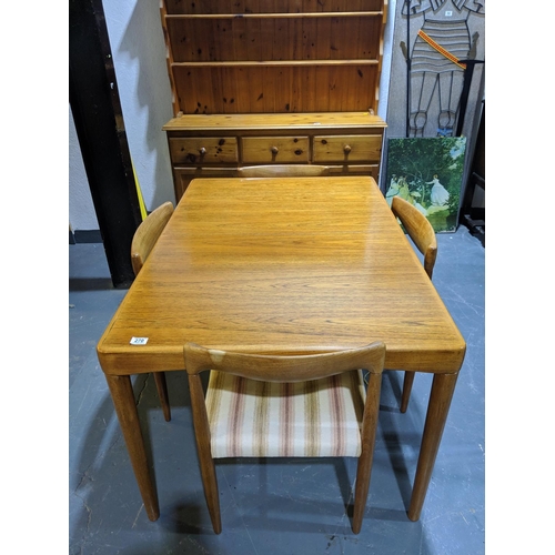 270 - A Mid Century, Danish, teak dining table and four chairs- made by Bramin