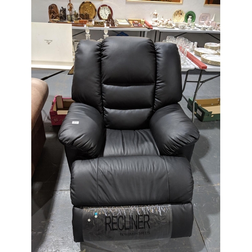 277 - Black leather T.C.S reclining chair