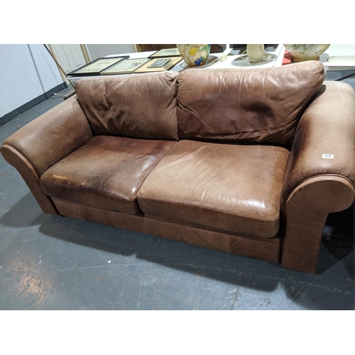 278 - Brown leather two seater settee