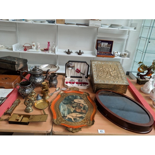 43 - A selection of brass and metalware, display case etc.