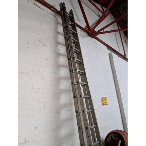 668 - Set of double aluminium extension ladders