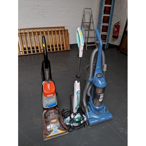 700 - Carpet cleaner, vacuum cleaner and a steamer