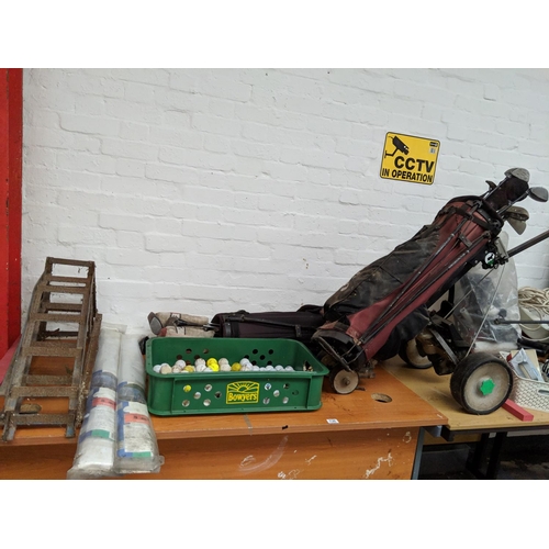 730 - Collection of golf clubs, balls, tents, vehicle ramps etc.