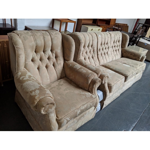 854 - Three seater sofa and matching armchair