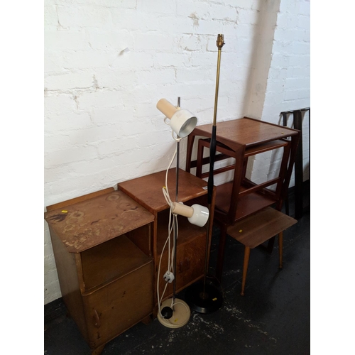 516 - Two standard lamps, side tables and two bedside cabinets