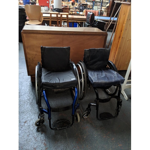 527 - Two lightweight sporting wheelchairs