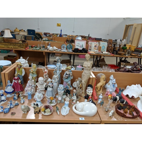 52 - A collection of figures and figurines including Beswick